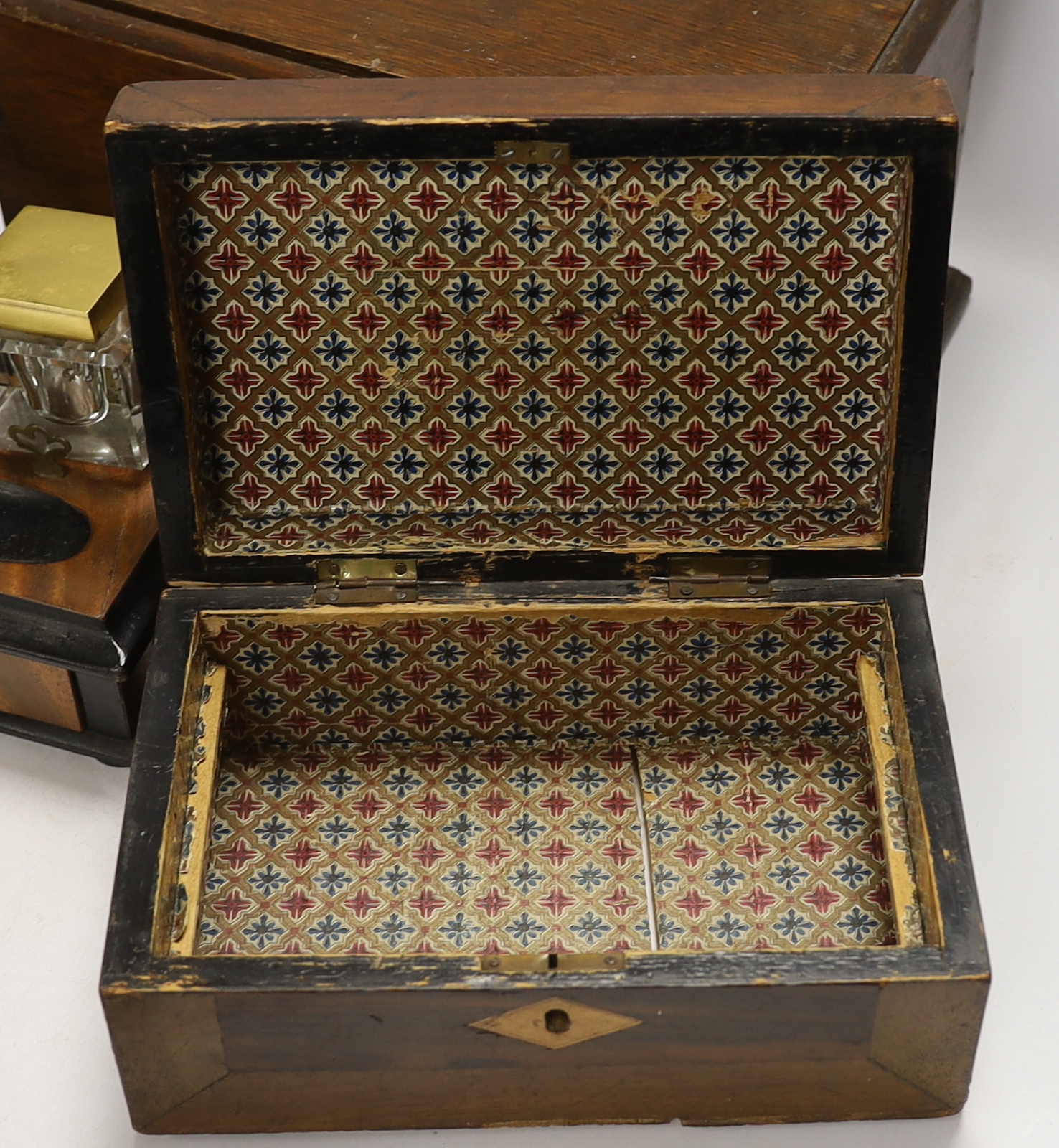 A walnut inkstand, an oak strong box and a rosewood box, 30cm x 18cm high